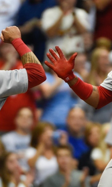 Adams, Taveras help Cardinals beat Brewers 5-3